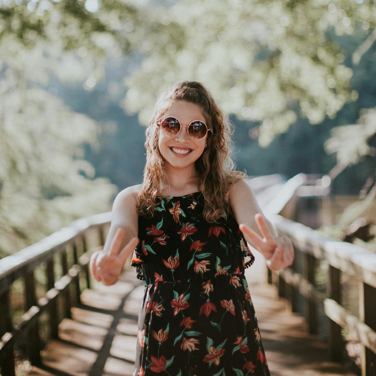 girl with sunglasses on a pier